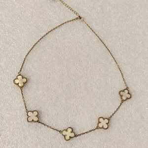 Elegant Gold and Cream Clover Necklace